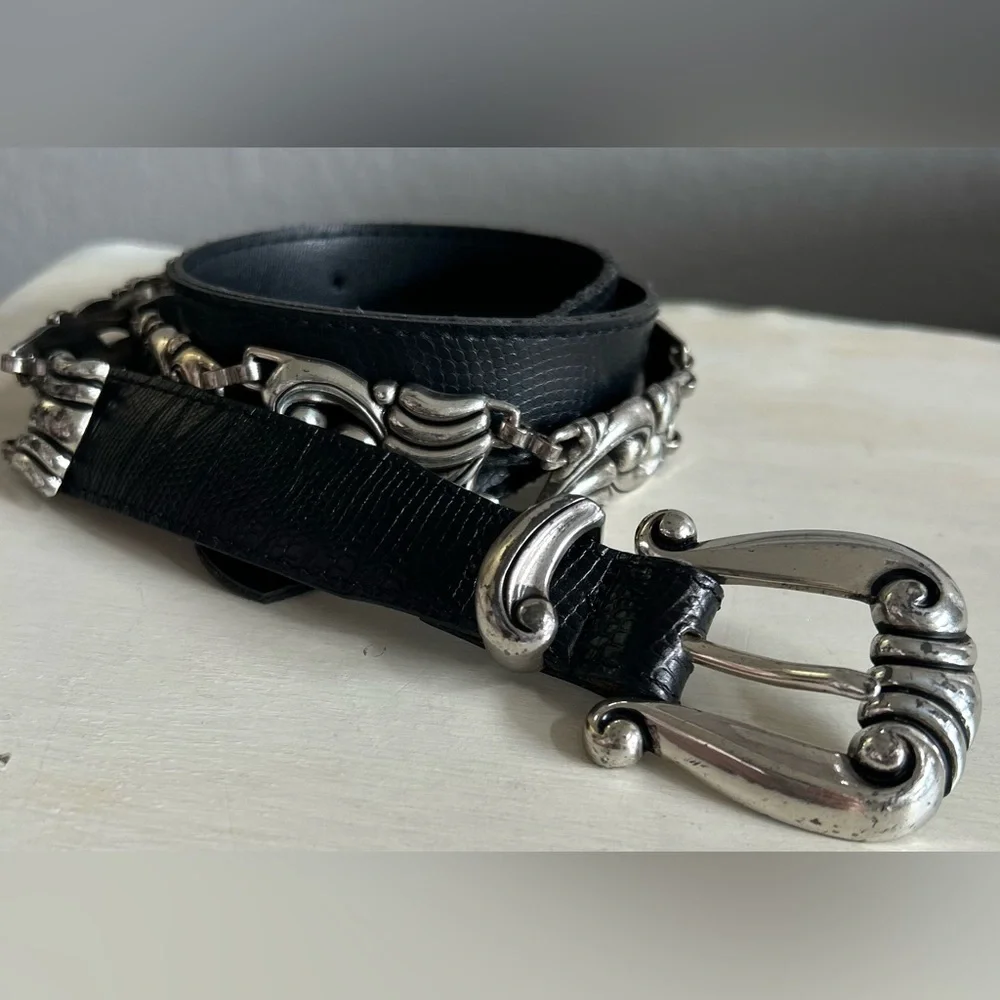 Brighton black leather belt with silver accents. Womens size small.